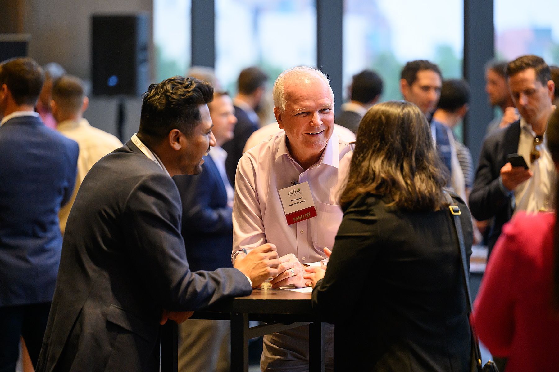 event attendees engage in discussions